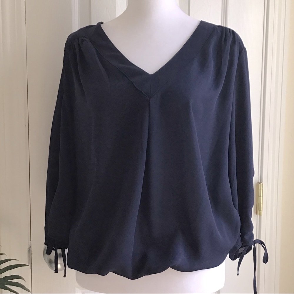 Banded bottom three quarter sleeve top